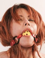 Moe Aizawa Asian with boobs in yellow ropes is fingered in slit